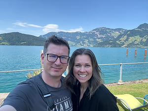 Jenny and Greger by a mountain lake on a clear summer day