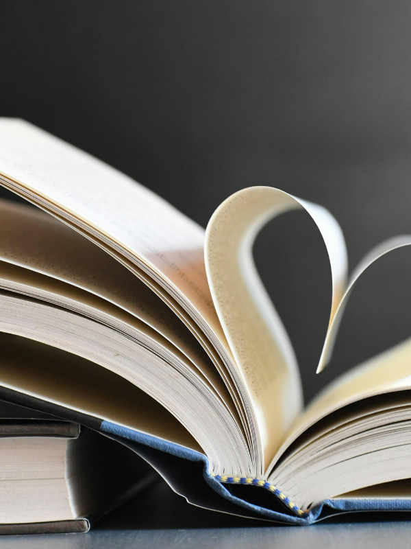 Printed book with pages folded into a heart